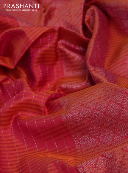 Pure soft silk saree dual shade of pinkish orange with allover silver zari stripe pattern and long silver zari woven border