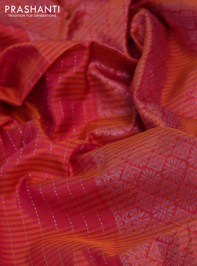 Pure soft silk saree dual shade of pinkish orange with allover silver zari stripe pattern and long silver zari woven border