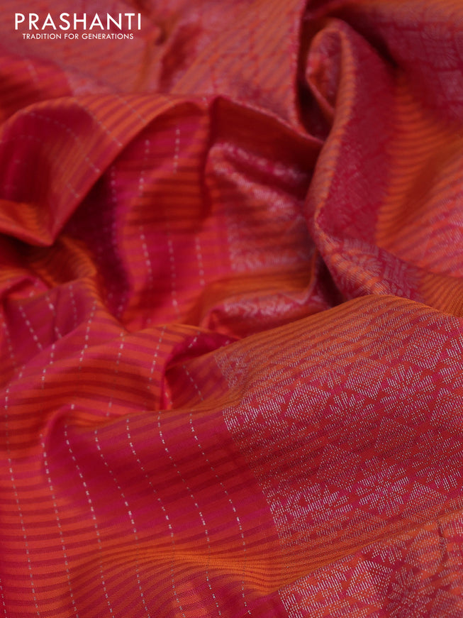 Pure soft silk saree dual shade of pinkish orange with allover silver zari stripe pattern and long silver zari woven border
