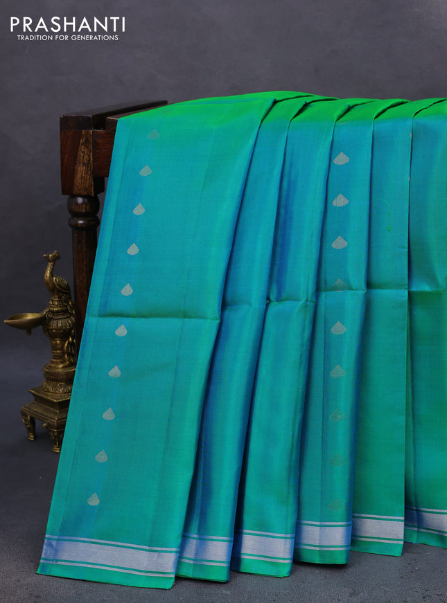 Pure soft silk saree dual shade of teal bluish green with silver zari woven buttas and silver zari woven border