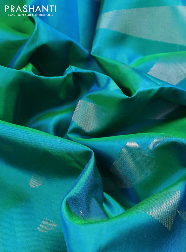 Pure soft silk saree dual shade of teal bluish green with silver zari woven buttas and silver zari woven border
