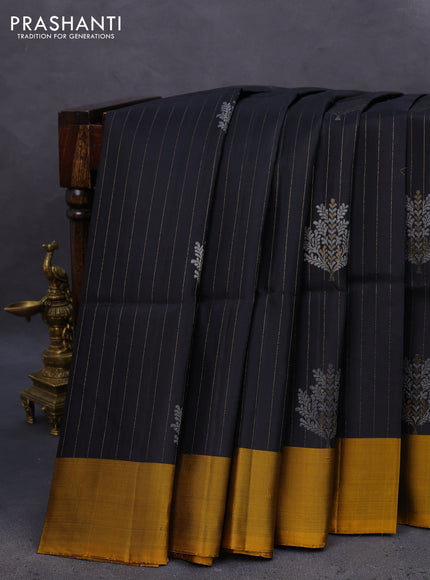 Pure soft silk saree black and mustard yellow with allover zari weaves & buttas and zari woven butta border