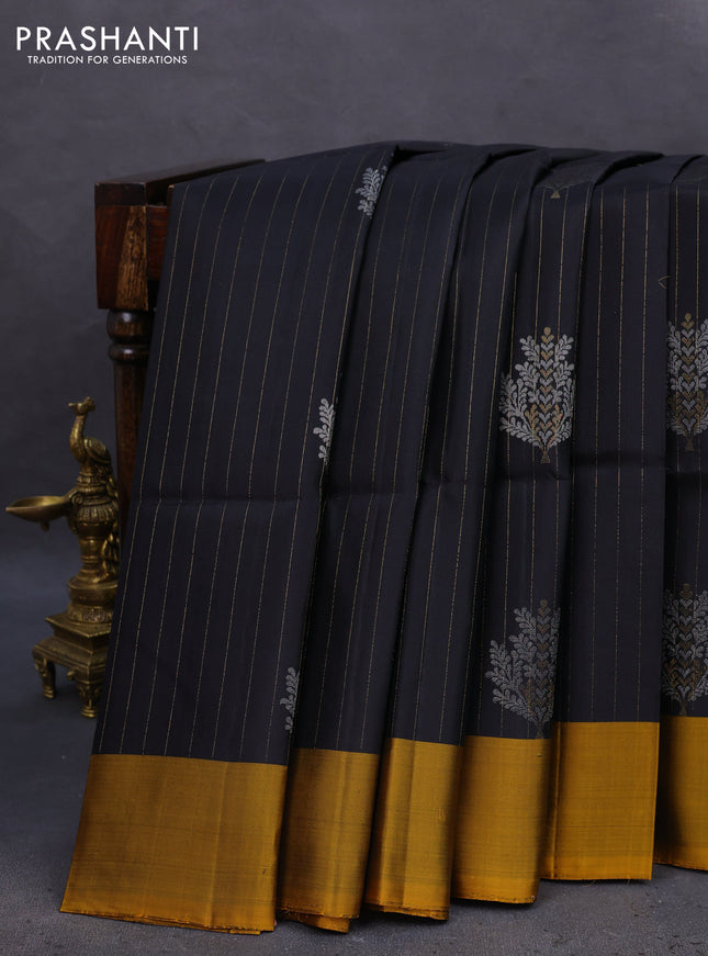 Pure soft silk saree black and mustard yellow with allover zari weaves & buttas and zari woven butta border