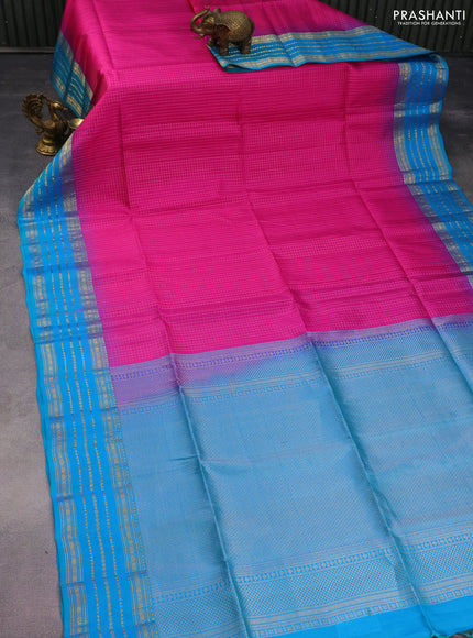 Pure soft silk saree magenta pink and dual shade of bluish green with allover zari woven checked pattern and zari woven border