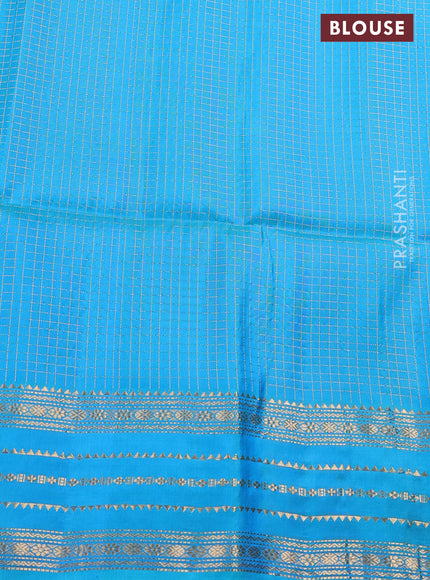 Pure soft silk saree magenta pink and dual shade of bluish green with allover zari woven checked pattern and zari woven border
