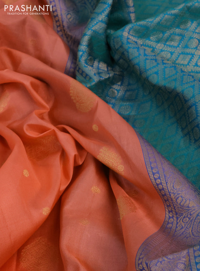 Pure soft silk saree peach orange and dual shade of bluish green with allover zari woven buttas and zari woven border