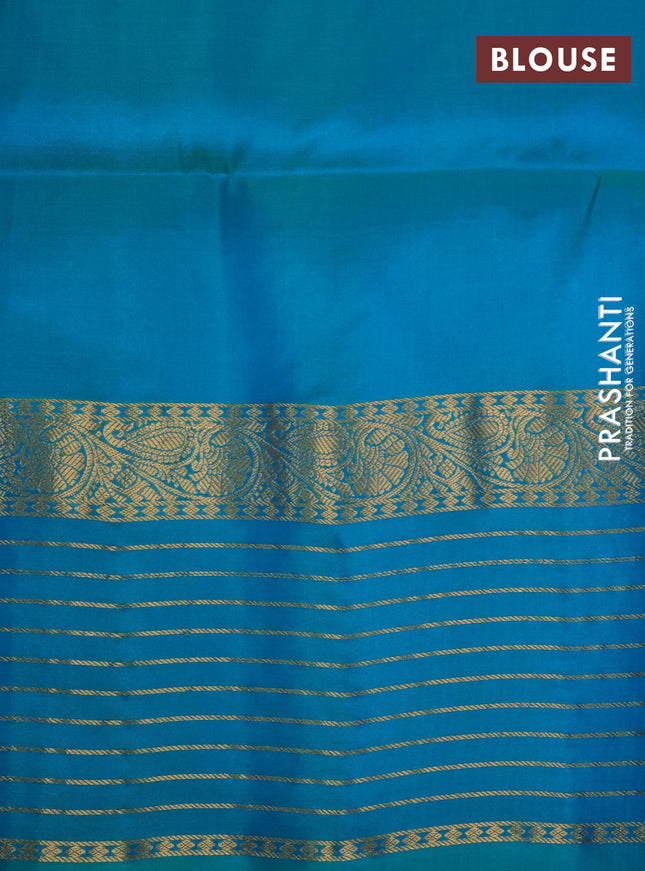 Pure soft silk saree peach orange and dual shade of bluish green with allover zari woven buttas and zari woven border