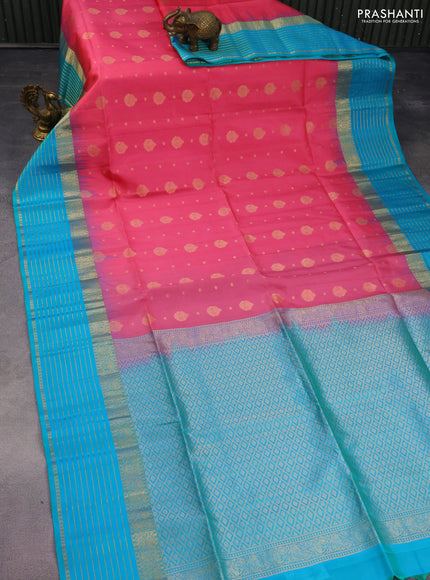 Pure soft silk saree peach pink and dual shade of teal bluish green with allover zari woven buttas and zari woven border