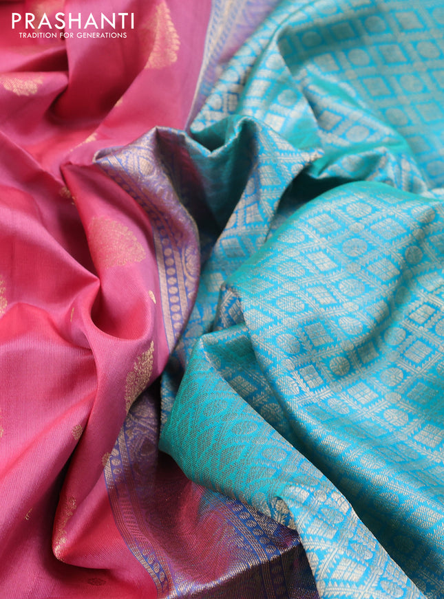 Pure soft silk saree peach pink and dual shade of teal bluish green with allover zari woven buttas and zari woven border