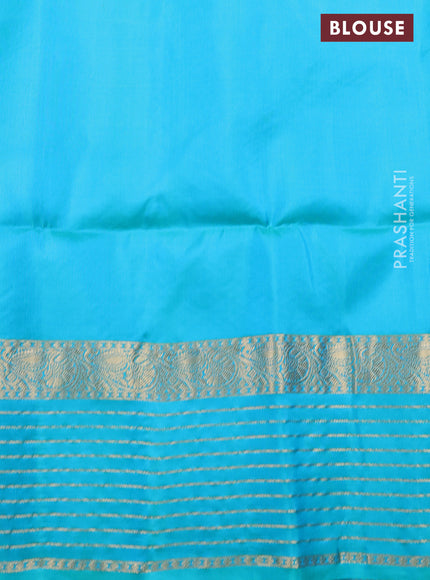 Pure soft silk saree peach pink and dual shade of teal bluish green with allover zari woven buttas and zari woven border