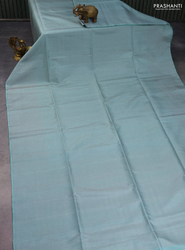Pure soft silk saree pastel green shade with allover thread & zari woven brocade weaves and long woven border