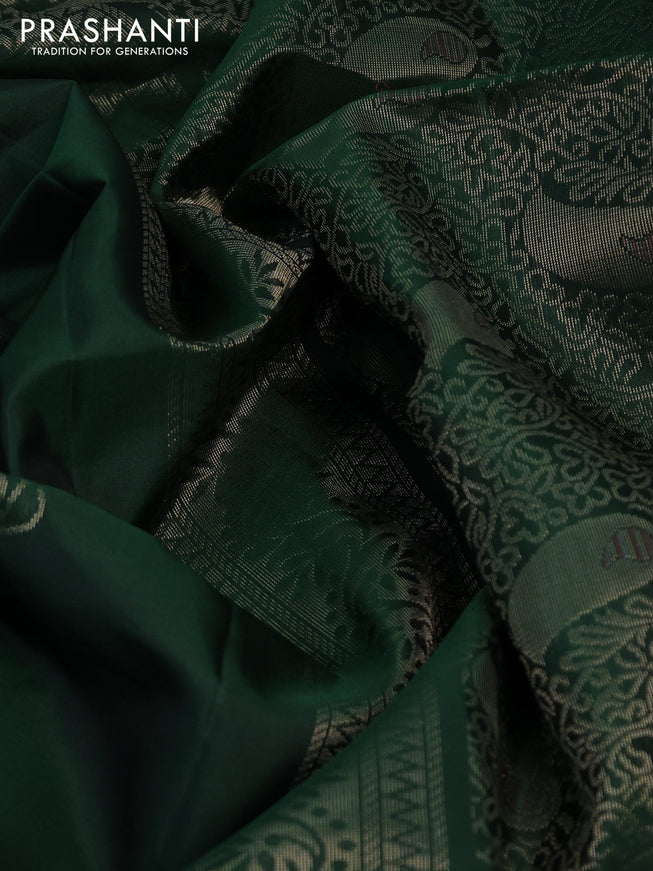 Pure soft silk saree green with zari woven buttas in borderless style