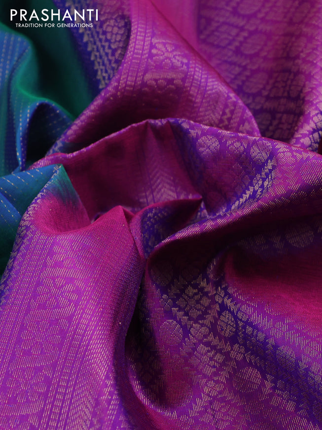 Pure soft silk saree dual shade of teal blue and purple with allover zari wevaes and rettapet zari woven border