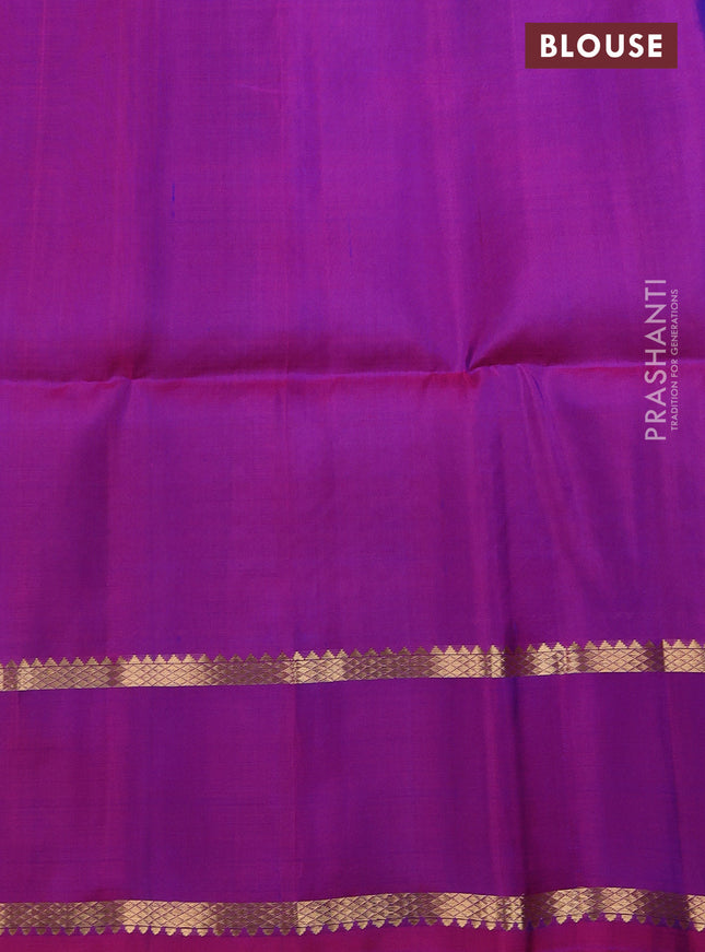 Pure soft silk saree dual shade of teal blue and purple with allover zari wevaes and rettapet zari woven border