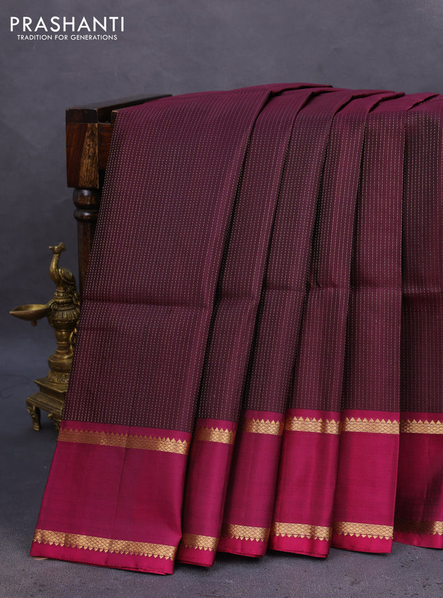 Pure soft silk saree brown and magenta pink with allover zari wevaes and rettapet zari woven border