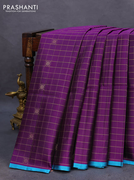 Pure soft silk saree deep purple and light blue with allover zari checks & buttas and piping border