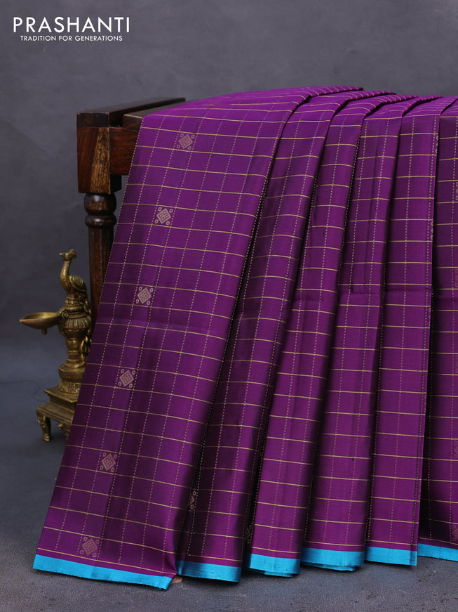 Pure soft silk saree deep purple and light blue with allover zari checks & buttas and piping border