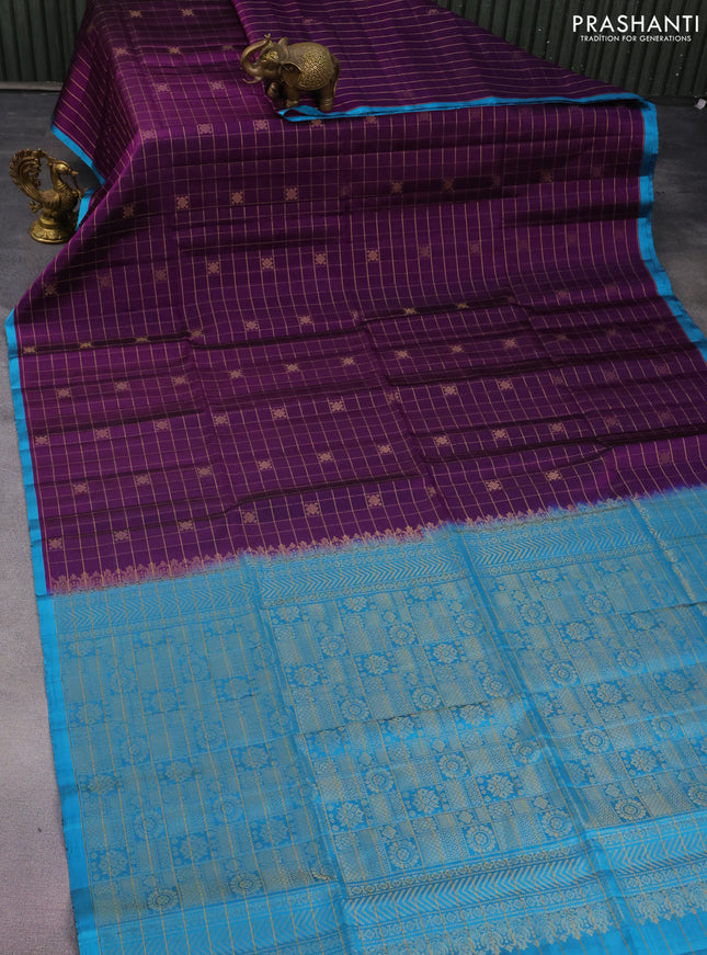 Pure soft silk saree deep purple and light blue with allover zari checks & buttas and piping border