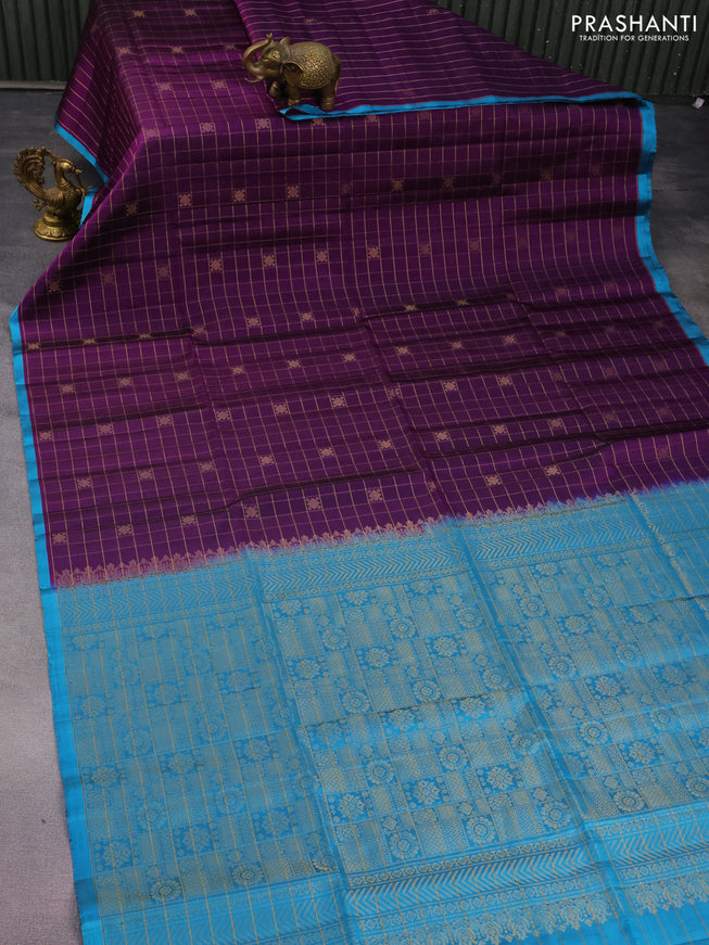 Pure soft silk saree deep purple and light blue with allover zari checks & buttas and piping border
