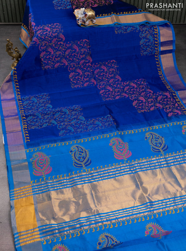 Silk cotton block printed saree blue and cs blue with allover prints and zari woven border