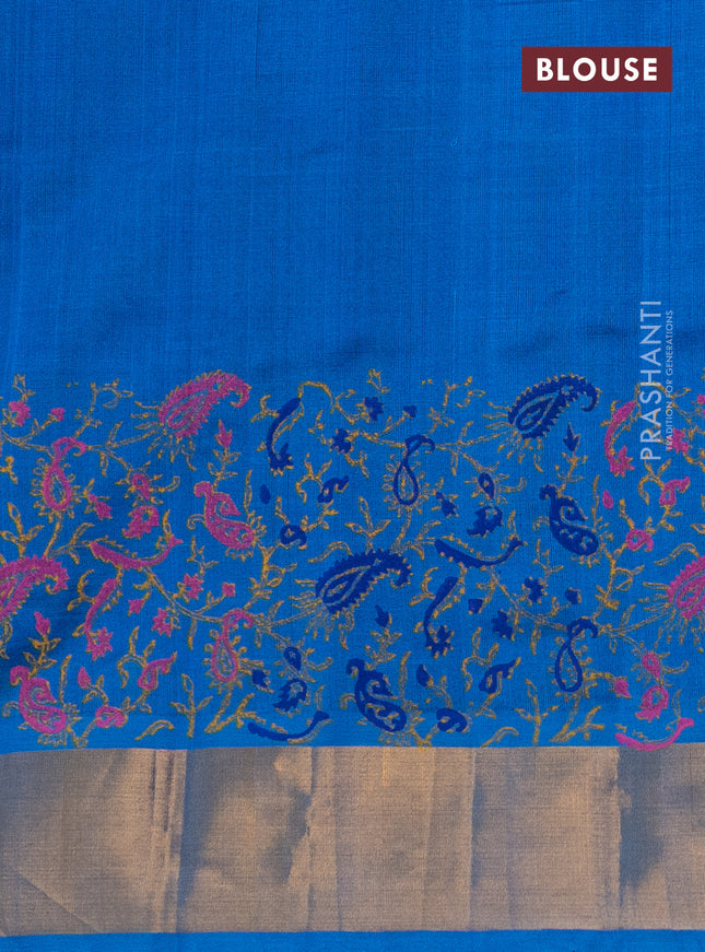 Silk cotton block printed saree blue and cs blue with allover prints and zari woven border