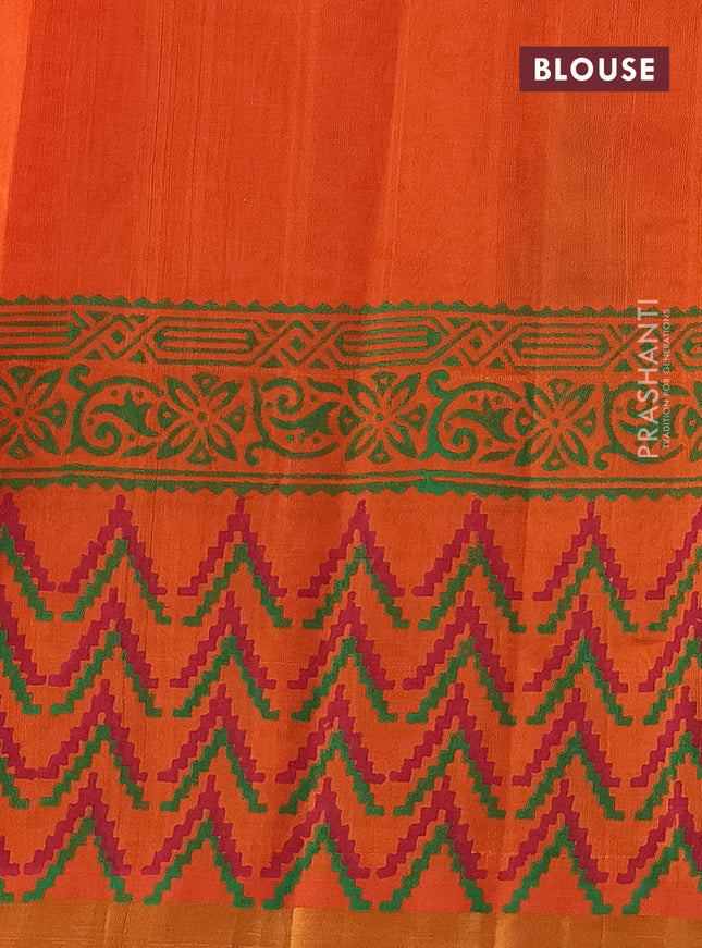 Silk cotton block printed saree orange with butta prints and zari woven border