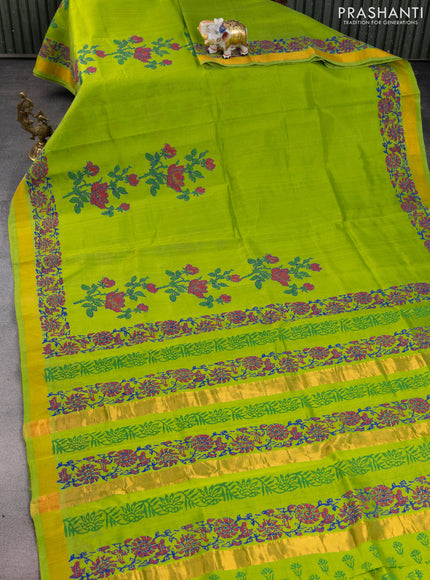 Silk cotton block printed saree light green with allover floral prints and zari woven border