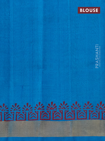 Silk cotton block printed saree cs blue with allover prints and zari woven border