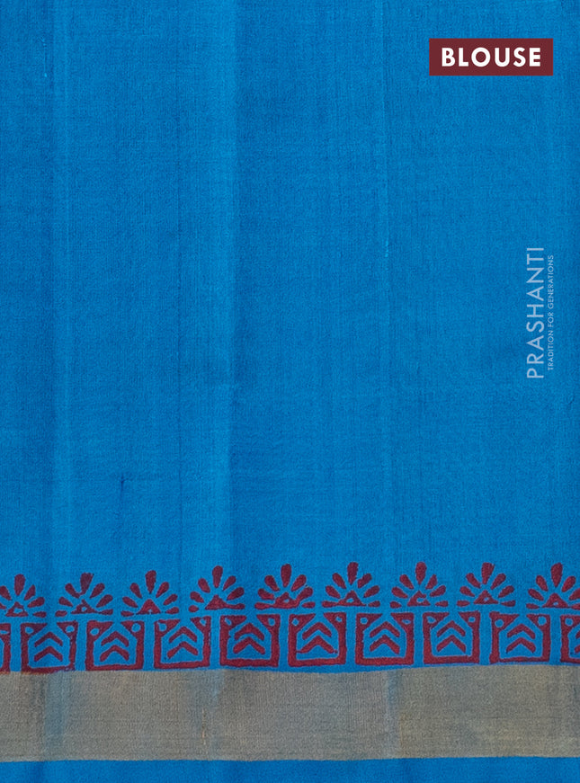 Silk cotton block printed saree cs blue with allover prints and zari woven border