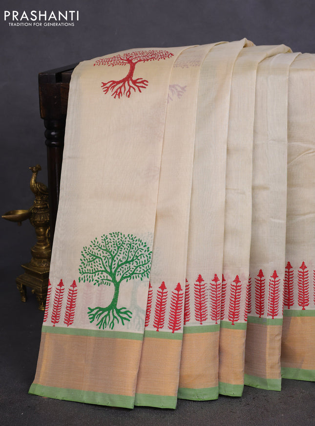 Silk cotton block printed saree cream and light green with butta prints and zari woven border