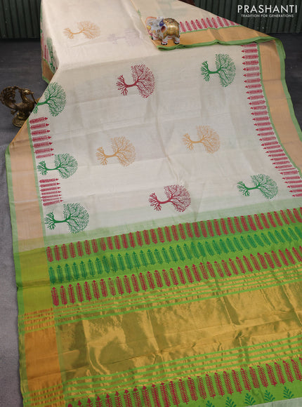 Silk cotton block printed saree cream and light green with butta prints and zari woven border