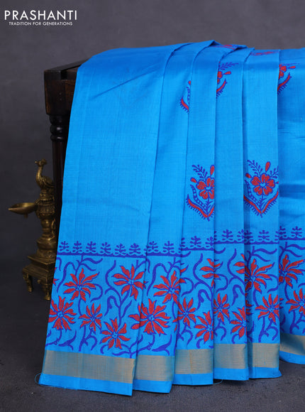 Silk cotton block printed saree cs blue with allover prints and zari woven border