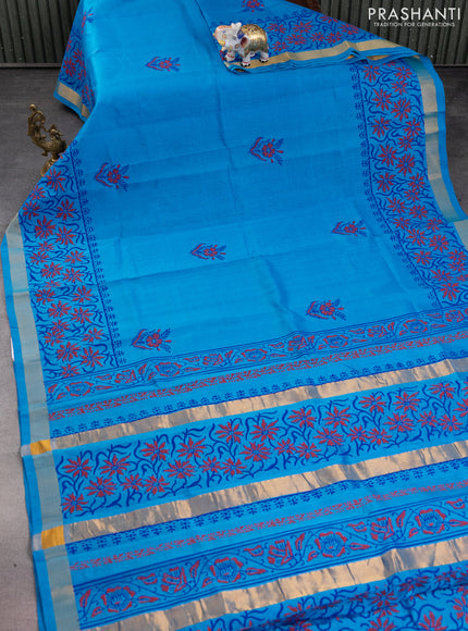 Silk cotton block printed saree cs blue with allover prints and zari woven border