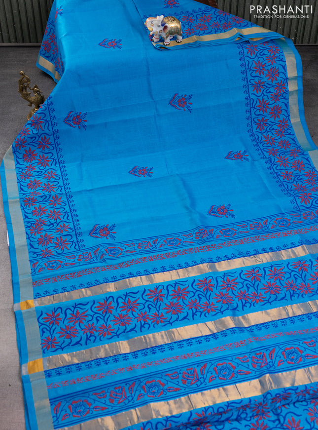 Silk cotton block printed saree cs blue with allover prints and zari woven border