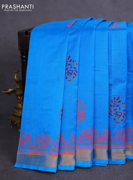 Silk cotton block printed saree cs blue with allover prints and zari woven border