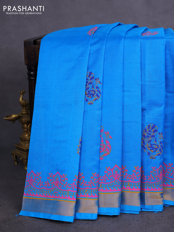 Silk cotton block printed saree cs blue with allover prints and zari woven border