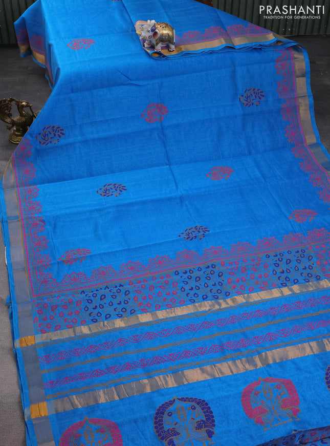 Silk cotton block printed saree cs blue with allover prints and zari woven border