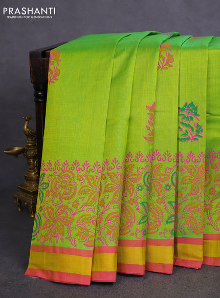 Silk cotton block printed saree light green and pink with allover prints and zari woven border