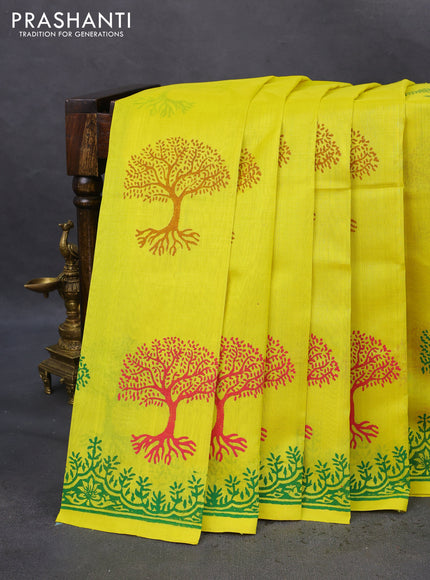 Silk cotton block printed saree yellow with tree butta prints and printed border