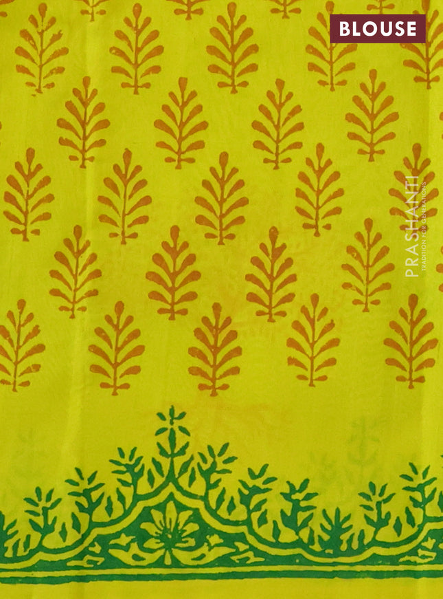 Silk cotton block printed saree yellow with tree butta prints and printed border