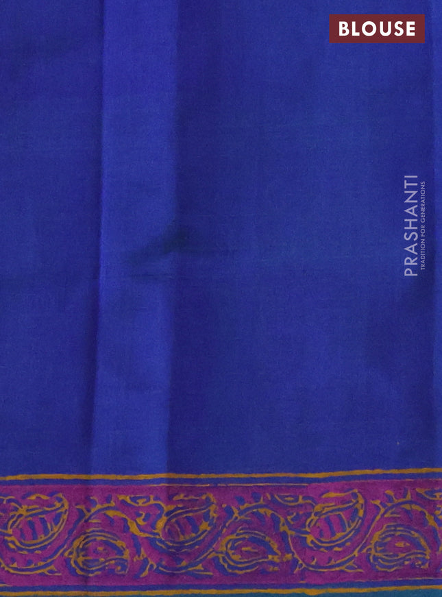 Silk cotton block printed saree dual shade of bluish green with butta prints and printed border