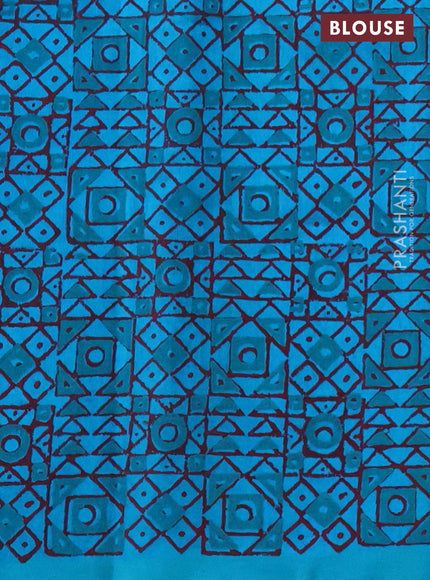 Silk cotton block printed saree teal blue with geometric butta prints and printed border