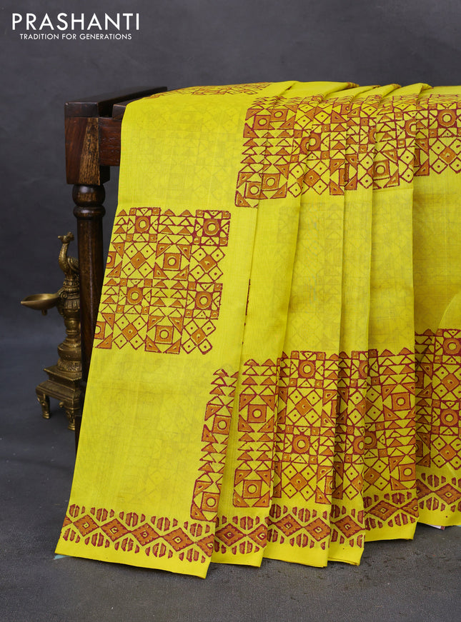Silk cotton block printed saree yellow with allover geometric prints and printed border