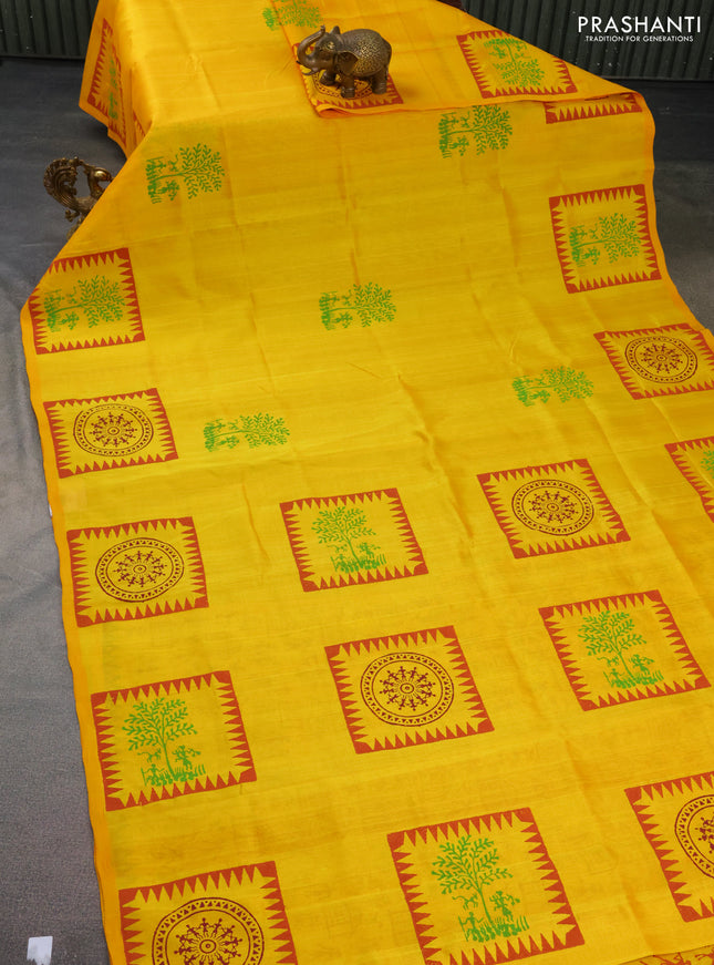 Silk cotton block printed saree yellow with allover warli butta prints and printed border