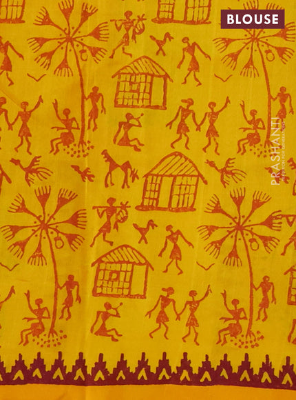 Silk cotton block printed saree yellow with allover warli butta prints and printed border
