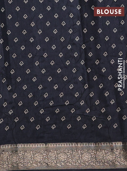 Semi dola saree black with floral prints & self emboss and zari woven border