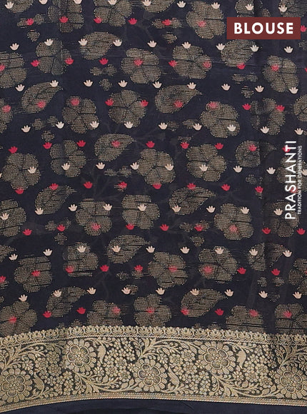 Semi dola saree black with butta prints & zari weaves and zari woven border