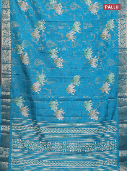 Semi dola saree cs blue with floral prints & zari weaves and zari woven border