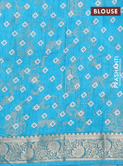Semi dola saree cs blue with floral prints & zari weaves and zari woven border