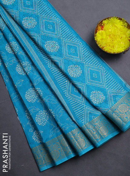 Semi dola saree cs blue with floral prints & self emboss and zari woven border